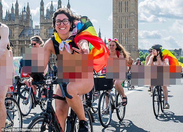 The cyclists grinned enjoying the London sunshine while cycling in the nude to celebrate body positivity