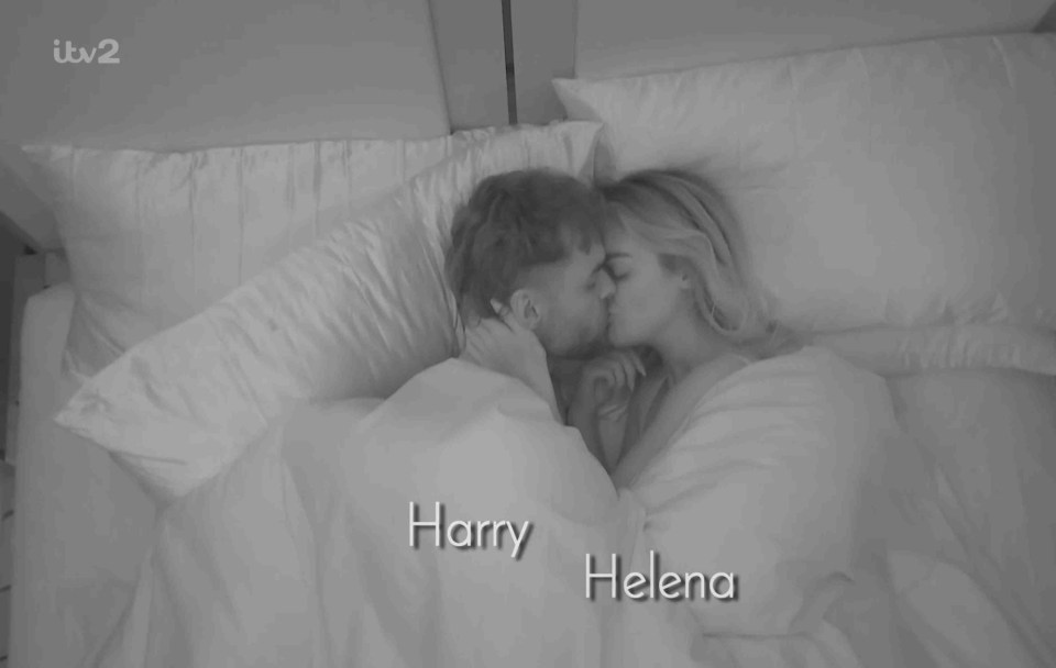Harry and Helena kissing in bed.