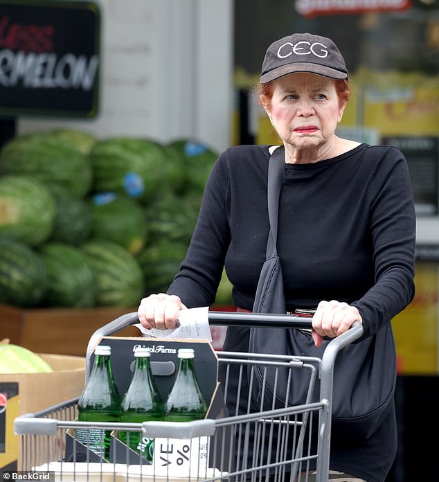 The actress, now 77, looked youthful as she was spotted grocery shopping at the upscale Bristol Farms market in West Hollywood - who is she?