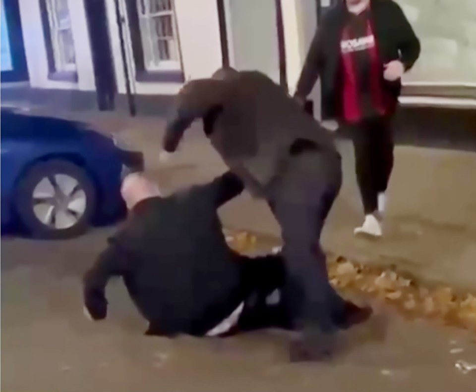 MP Mike Amesbury punching a person.