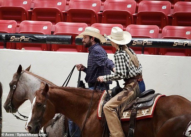 Her cowboy boyfriend Adan Banuelos was at the show and held her hand as they rode out of the ring side-by-side