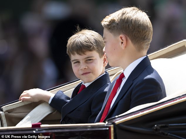 The brothers wore matching suits with striking red ties