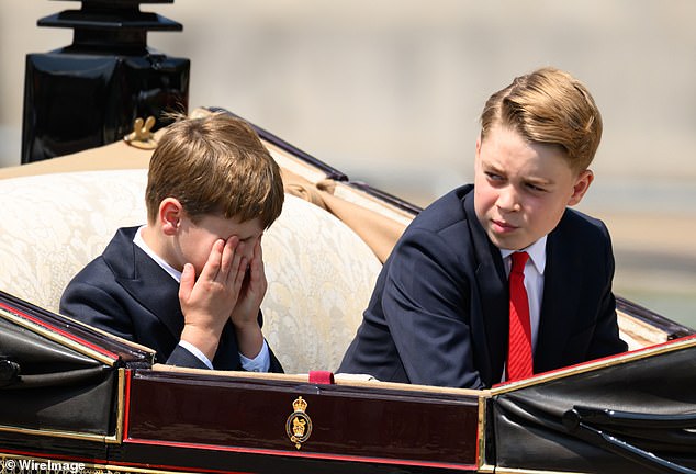 Mimicking his older brother, Prince Louis also placed his hands over his eyes