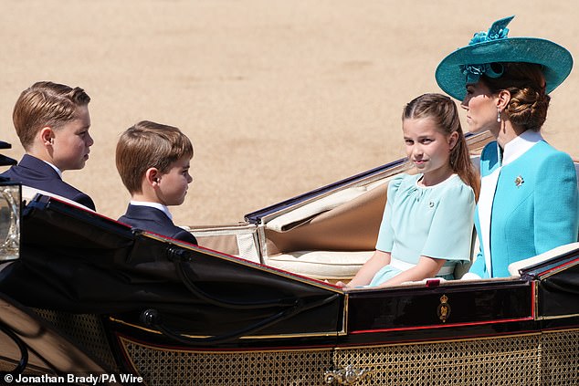 The Wales children and their mother Catherine ride along the Mall towards Horse Guards Parade on Saturday