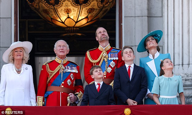 The royals watch a flypast involving aircraft including the Red Arrows, Chinook helicopters and a Lancaster bomber