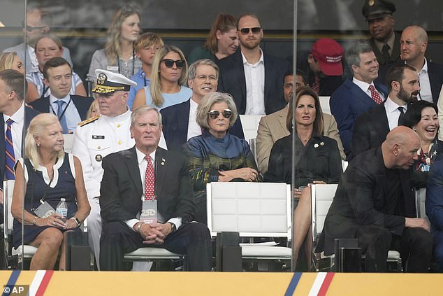 White House Chief of Staff Susie Wiles sat second row wearing a large pair of reflective sunglasses. Dana White (first row, right), the Trump pal and Ultimate Fighting Championship CEO, scored a prime seat to the parade