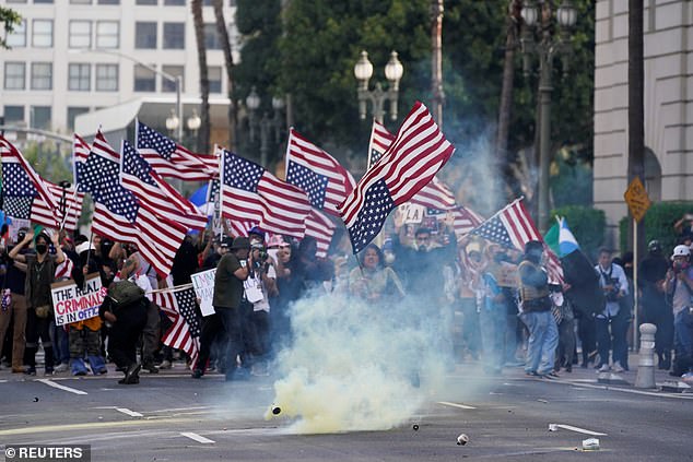 While demonstrations at the actual parade were few and far between, some 'No Kings' protests, including this one in Los Angeles turned chaotic with tear gas being dispersed