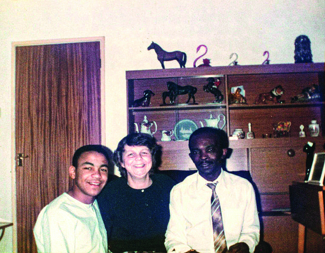 Mr Downes had a tough childhood, sometimes going hungry. (Pictured with his parents aged 16)
