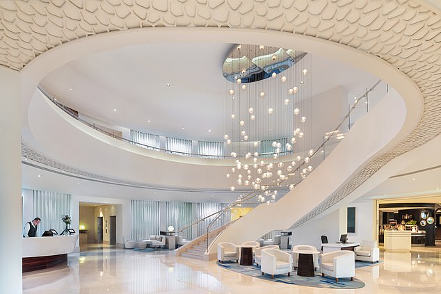 JA Ocean View's reception area is a sweeping cool white space that brings instant calm from the heat and bustling adventure that awaits outside the hotel doors.
