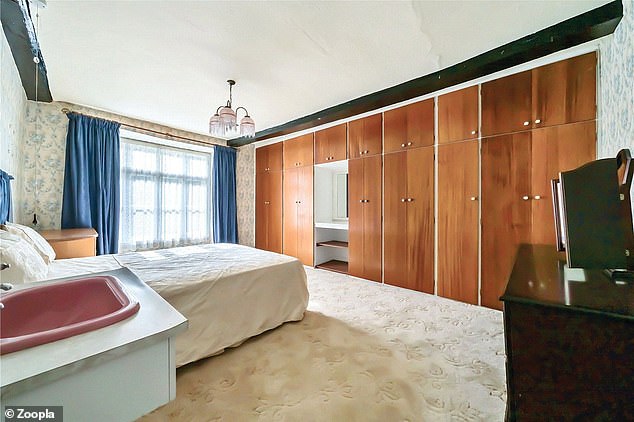 Another large bedroom with an impressive amount of storage space