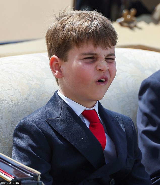 The animated youngster pulled faces throughout the parade, as he shared a carriage with his mother and siblings