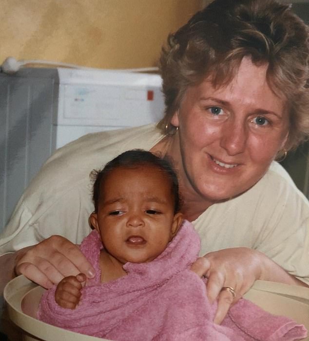 Cheryl posing happily with baby Misti Lekimenju, who is now 27