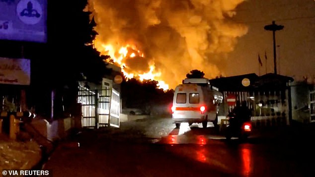 Flames and smoke rise, following what the Iranian Red Crescent Society says was an Israeli strike, in a location given as Tehran, Iran, in this screengrab taken from a handout video released on June 15, 2025
