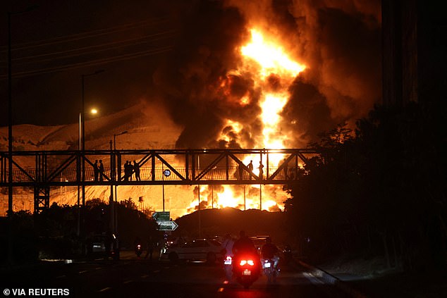 Fire of Israeli attack on Sharan Oil depot is seen following the Israeli strikes on Iran, in Tehran, Iran, June 15, 2025