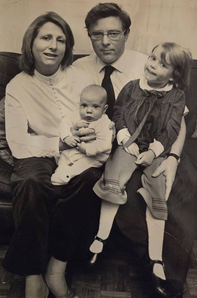 Black and white photo of a family portrait.