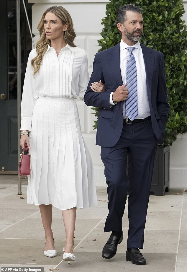 Don Trump Jr's girlfriend Bettina Anderson missed the mark with her all-white ensemble. The pleated long-sleeve shirt and skirt combination left the model, 38, looking a little lackluster and somewhat stiff as she took her place on stage. The singular pop of color came from her small red clutch