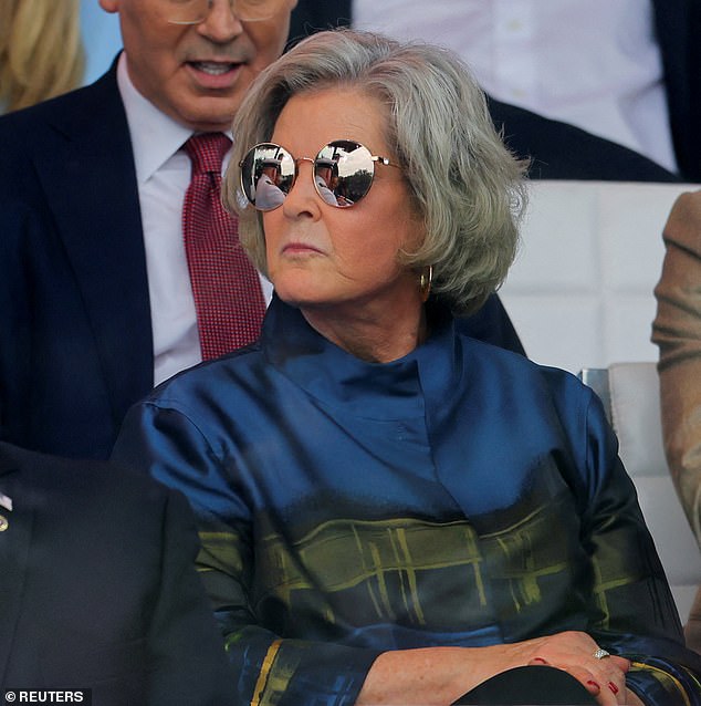 White House chief of staff Susie Wiles, 68, wore a chic print multi-jacket from Lafayette 148 with a pair of black pants and flat pumps. But her understated ensemble was ruined by her bold choice of sunglasses which caused glaring reflections that distracted many from her prominent viewing spot
