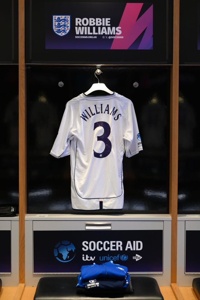 Robbie Williams' Soccer Aid for UNICEF jersey in the England dressing room.