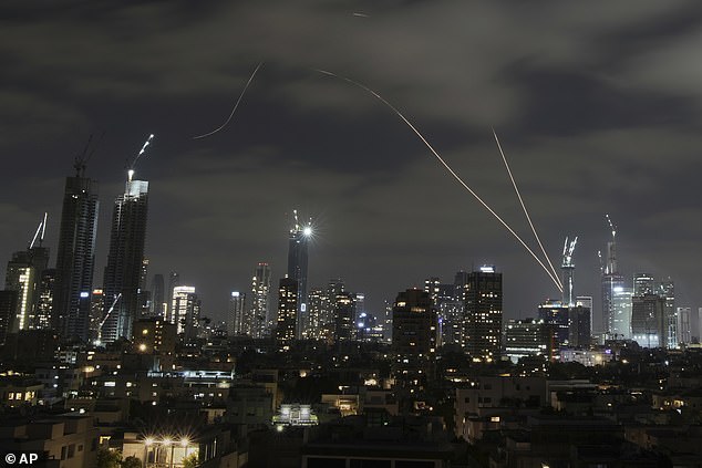 The Iron Dome, the Israeli air defense system, intercepts missiles fired from Iran, over Tel Aviv, Israel, 15 June 2025