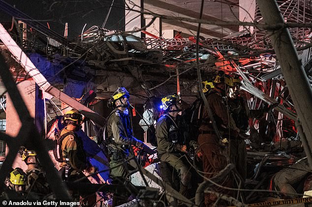 Israeli civil defense and emergency responders conduct nighttime search and rescue operations