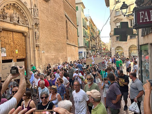 Protesters took to the streets in Mallorca telling Brits to 'go home' amid soaring rent and housing prices
