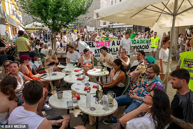 Protests also took place on the Spanish island of Ibiza in front of tourists eating their meals