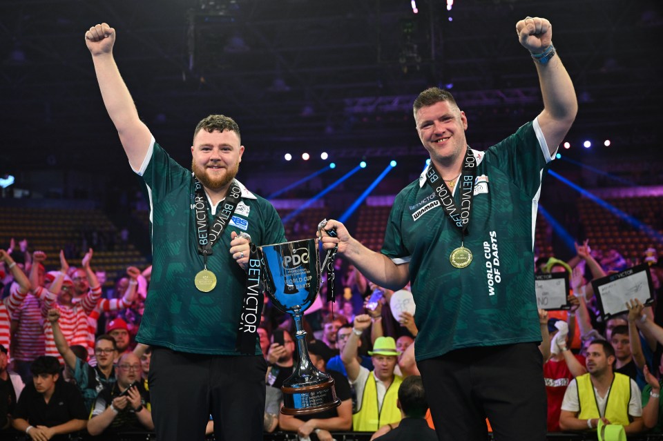 Josh Rock and Daryl Gurney of Northern Ireland celebrating their World Cup of Darts victory.