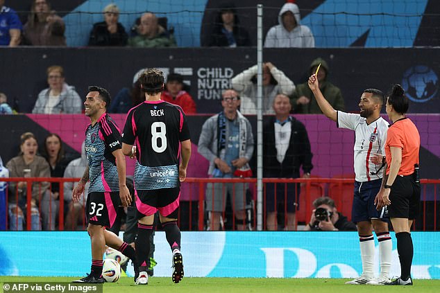 Tevez was booked for hauling down Aaron Lennon late on - with the referee allowing the former England winger to show the Argentine the yellow card