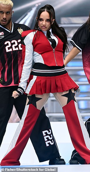 Jade looked incredible in her kooky stage costume which boasted a skimpy mini skirt and chaps