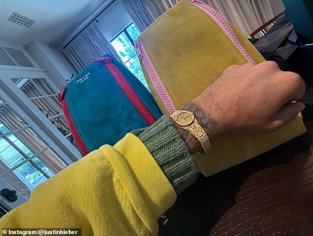 The timepiece was accompanied by two suede Prada bags, one turquoise and bright pink, the other yellow and baby pink. 'Happy daddy day to me u lil ho,' he wrote