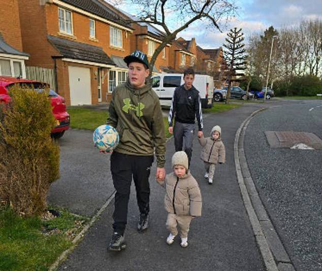 Ms Weighell's son Seth and his best friend Oliver with their nextdoor neighbour's twins pictured walking in the local area, just 500m from the incinerator site