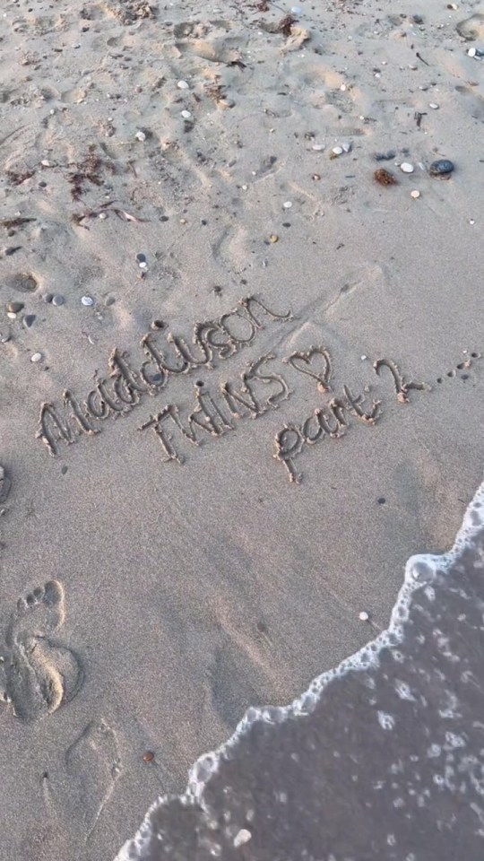 Message written in the sand: "Maddison Twins Part 2..."