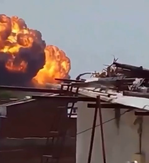 Large fireball and debris from a plane crash.