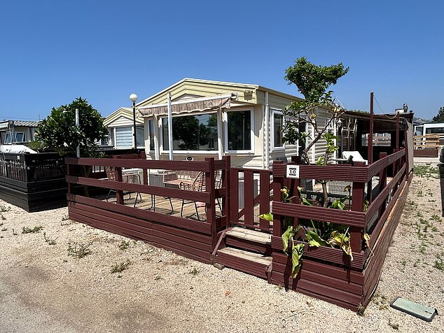 Camping sites filled with mobile homes are popping up across the country to fulfil a growing demand for an affordable place in the sun (pictured: a home at Camping Valle Niza)