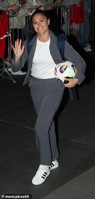 Sam Quek arrived with a football from the game
