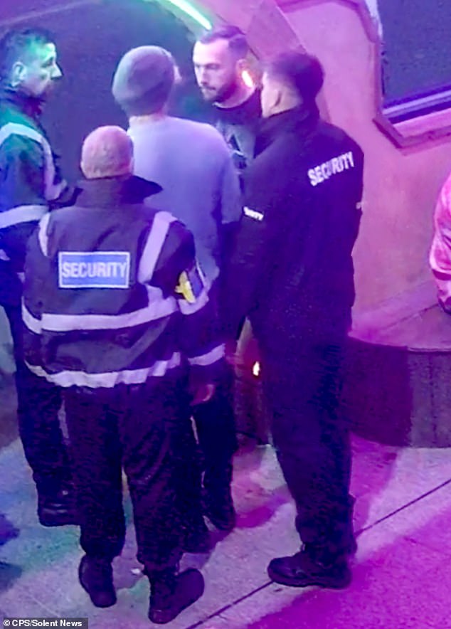 Tensions between the pair rise with McWalter holding intense eye-contact with the man who is surrounded by security