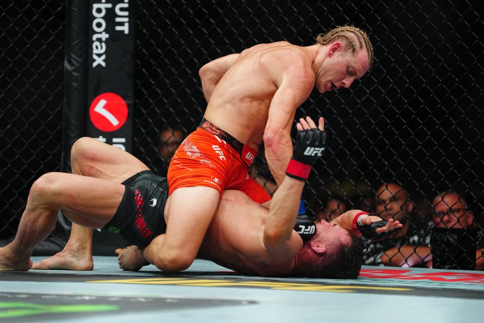 Michael Chandler and Paddy Pimblett in a UFC match.