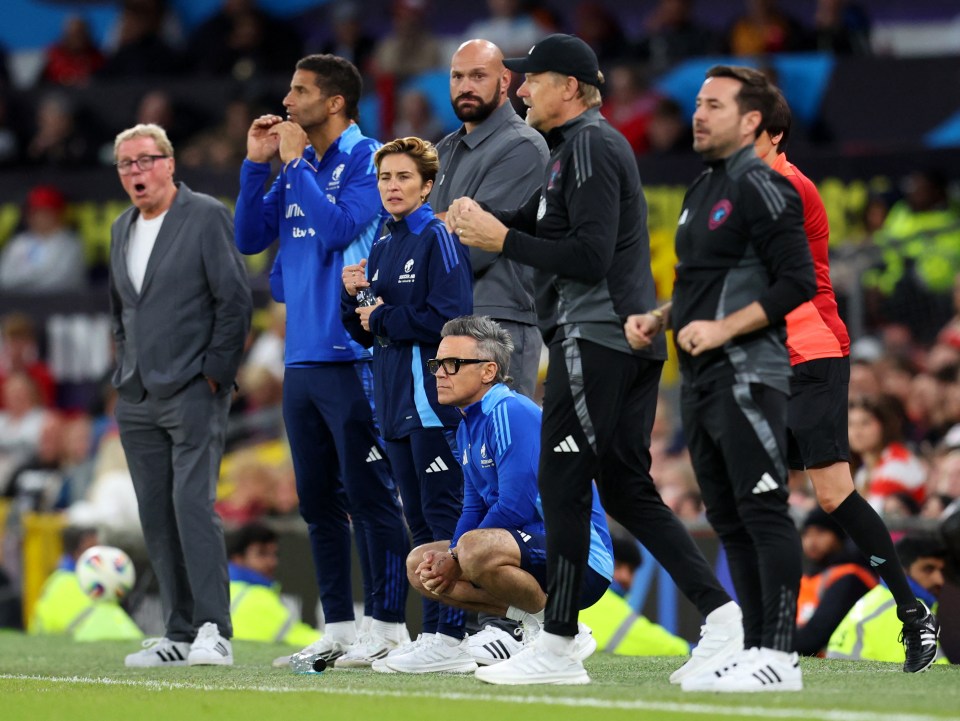 Robbie Williams, Harry Redknapp, Tyson Fury, and David James at a Soccer Aid charity match.
