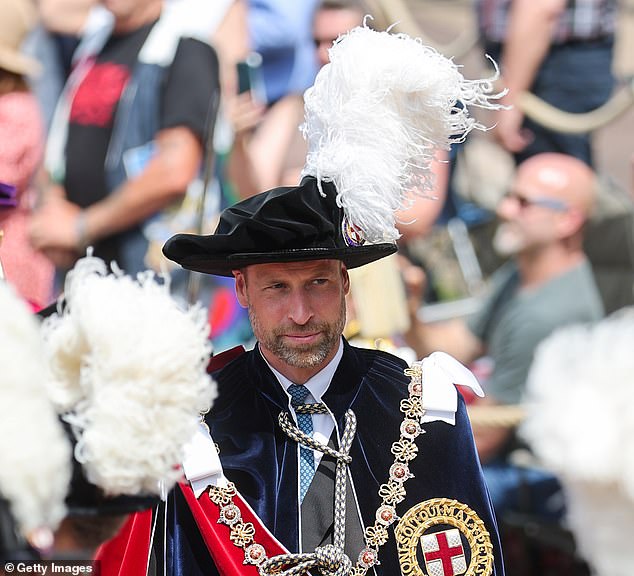Prince William at the Order of the Garter ceremony, dressed to the nines in his blue velvet cloak - complete with a hat adorned with plumes of ostrich feathers