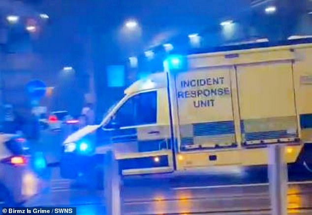 Pictured is an ambulance as it appears to rush to the scene following the accident
