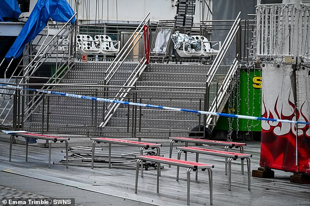 Pictured is the scene of the incident in Birmingham the next day, the ride taped off by police