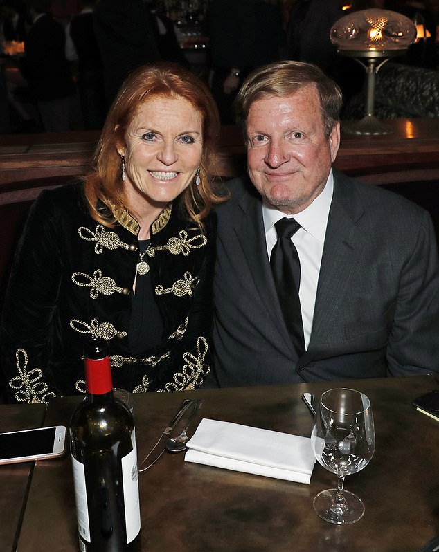 Mr Burkle (right) has rubbed shoulders with Elton John and the Duchess of Yorn, Sarah Ferguson (left)
