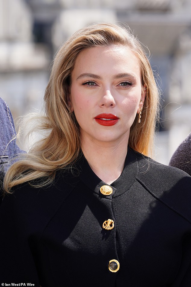 The American acting legend dazzled in the long-sleeve number, which featured a slew of gold buttons