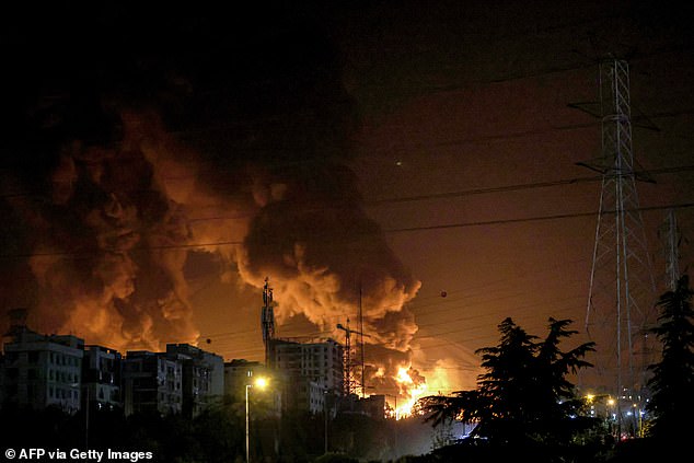 A fire blazes in the oil depots of Shahran, northwest of Tehran, on June 15, 2025