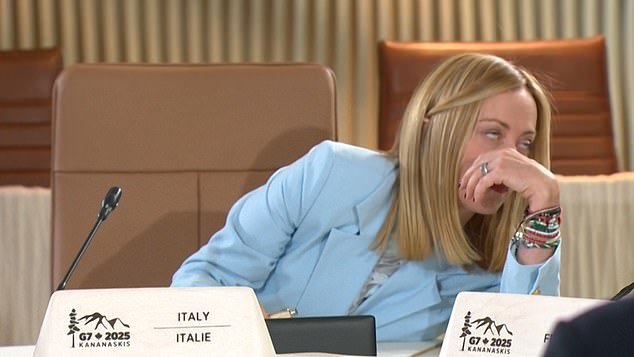The Italian PM then proceeded to roll her eyes in reaction to whatever the French President has said to her