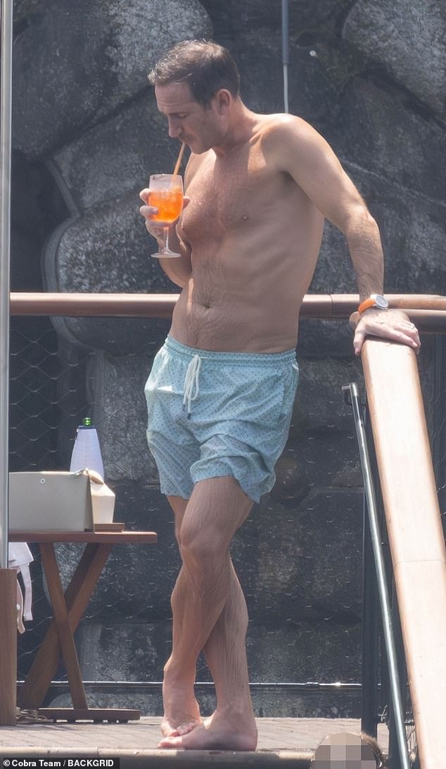 Meanwhile Coventry City manager Frank showed off his ripped physique as he and Christine sipped on Aperol spritzes