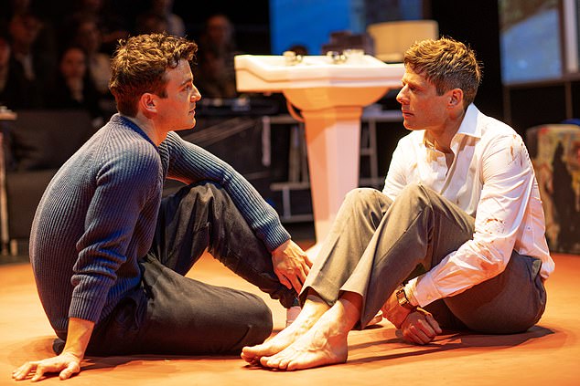 Meanwhile James' previously gave up drinking for his starring role in bleak three hour long play A Little Life in 2023 (James, R, pictured in the play)