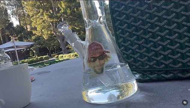 Another photo that has sparked concern for Beiber, showing a bong on a poolside table