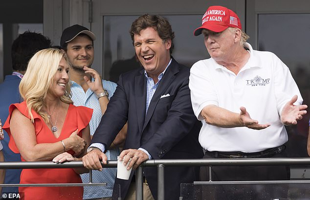 Greene (pictured left) - one of Trump's (pictured right) closest allies in Congress and a conservative firebrand who is also against war with Iran - rushed to Carlson's (pictured center) defense after Trump immortalized the broadcaster with a nickname