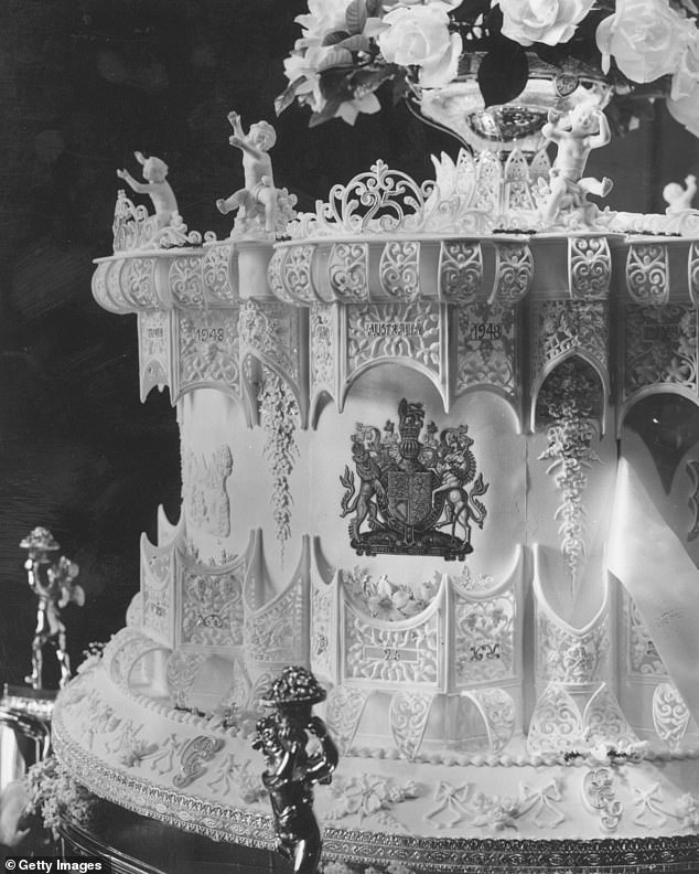 The decorative wedding cake emblazoned with the coat of arms